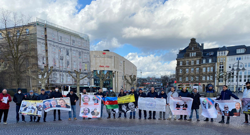 Azerbaijani migrants living in Germany at a protest action in defense of the rights of activists arrested in Baku after deportation. Photo provided by the event organizer