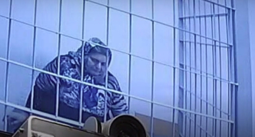 Zarema Musaeva in jail. Image made from the video posted by 1ADAT Activist at: https://www.youtube.com/channel/UC5bAexZDDykZSEyZ0qjGSGA
