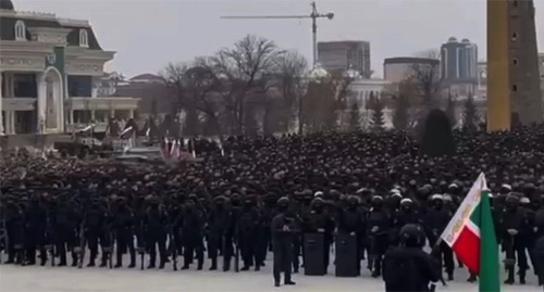 Chechen fighters at a rally in Grozny, February 2022. Screenshot: https://www.rbc.ru/politics/25/02/2022/6218c4089a7947a8fc3e9640