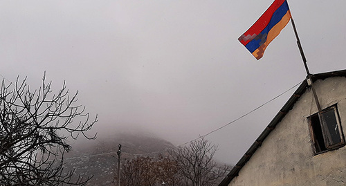 The flag of Nagorno-Karabakh on a house in the village of Khramort in the Askeran District of Nagorno-Karabakh. Photo by Alvard Grigoryan for the "Caucasian Knot"