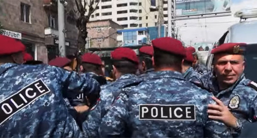 Police officers during a protest in Yerevan. April 25, 2022 Image made from video posted by the Caucasian Knot: https://www.youtube.com/watch?v=bf_ejl2vVS8