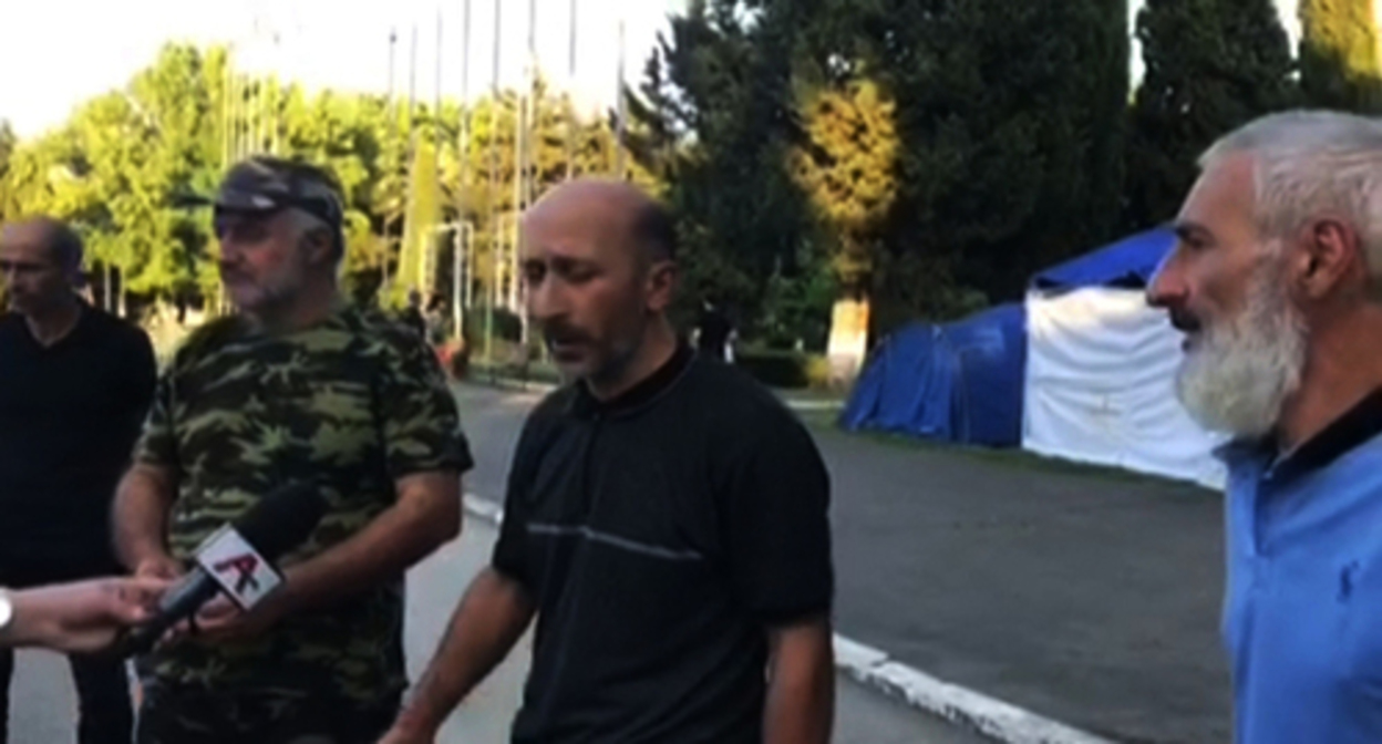 Djansukh Adleiba, an activist (in the centre), at a protest action. July 29, 2022. Screenshot of the video https://t.me/respublicaabh//4582