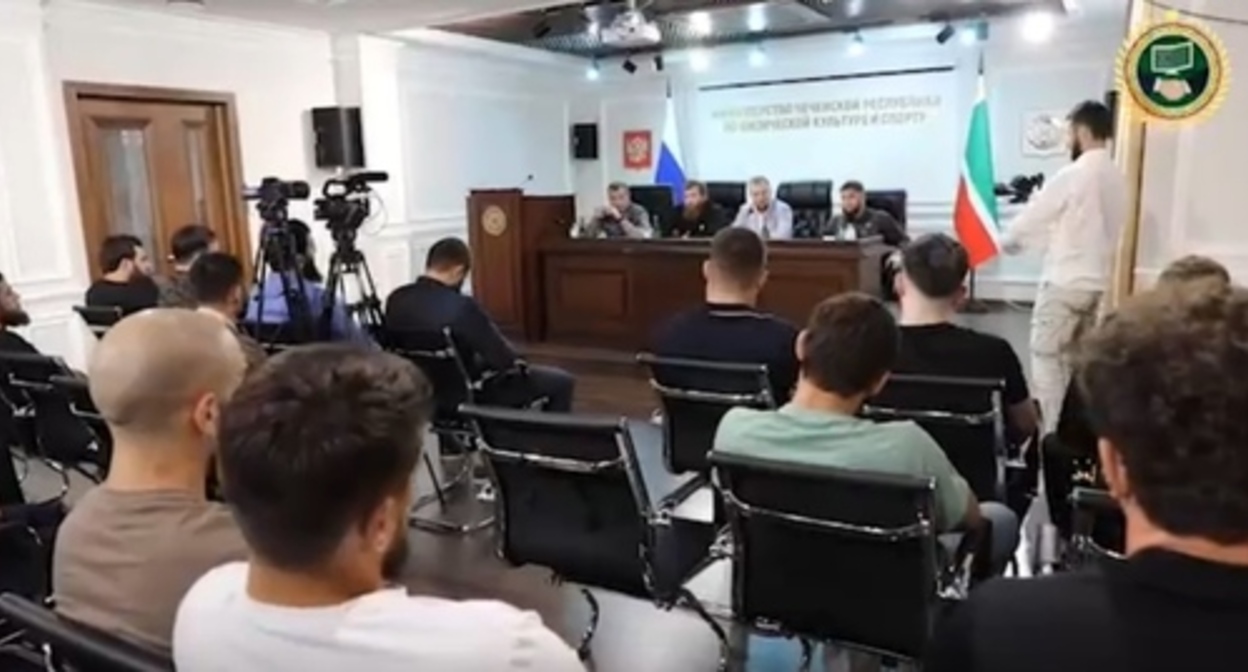 Chechen athletes at a meeting with representatives of the authorities. Image made from video posted by the Telegram channel of the Minister for National Policy of Chechnya Akhmed Dudayev https://t.me/akhmeddudaev/814