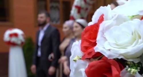 A wedding in Chechnya. Screenshot of the video posted on the YouTube channel "Chechen Weddings". Sharkhan Video Studio https://www.youtube.com/watch?v=gt-OQMRN2Mo