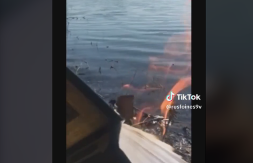 A still of the video about the burning of the Koran in Moscow. Screenshot of the video from the account rusfoines9v on TikTok https://www.tiktok.com/@rusfoines9v/video/7221832947689606405