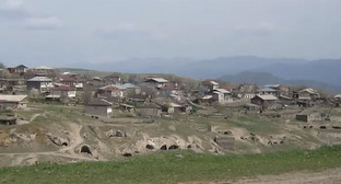 The village of Tekh. Screenshot of the video https://www.youtube.com/watch?v=vBEoSfDtbSc