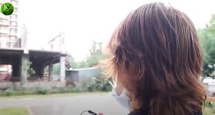 A girl detained in Makhachkala. Screenshot of a video by the "Caucasian Knot" https://www.youtube.com/watch?v=Bwbrt69oPpo