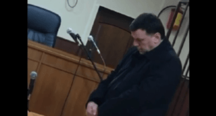 Tagir Velagaev in a court. Screenshot of a video posted on March 19, 2022 https://www.youtube.com/watch?v=NlNf4EyaD80