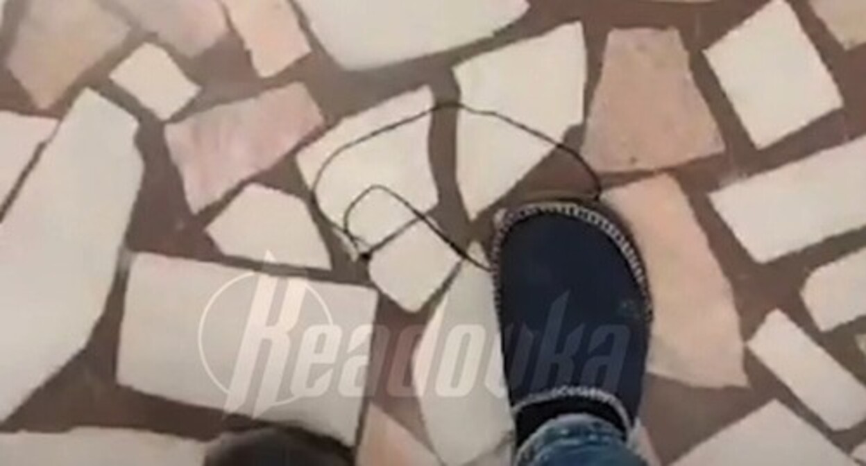 Blogger from Dagestan trampled on a Christian cross during a live broadcast on the Internet. Screenshot of a video posted by the "Readovka" on July 17, 2024 https://cdn.readovka.ru