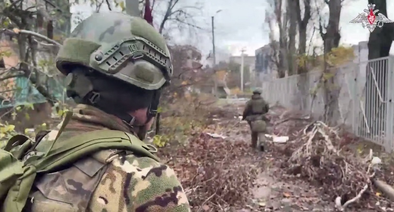 Russian troops in a combat zone. Still from a Defense Ministry video: https://t.me/mod_russia/58925 Russian troops in a combat zone. Still from a Defense Ministry video: https://t.me/mod_russia/58925