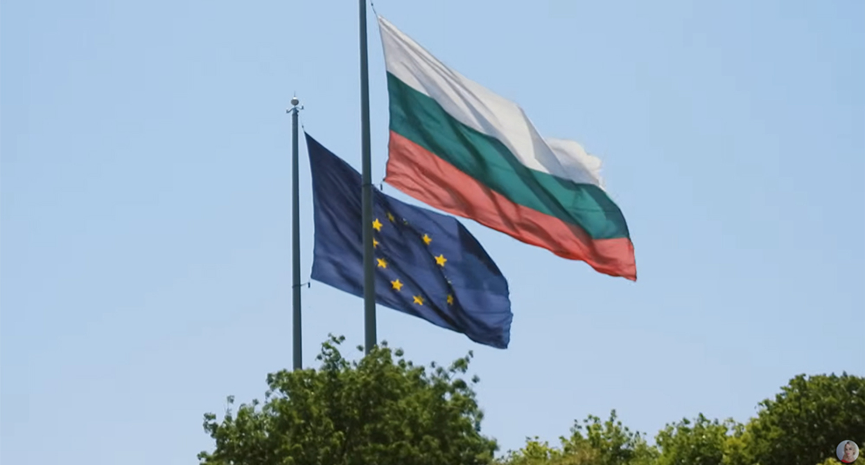 Flags of Bulgaria and the European Union. Frame from the video https://www.youtube.com/watch?v=rB3aPYxDSoo Flags of Bulgaria and the European Union. Frame from the video https://www.youtube.com/watch?v=rB3aPYxDSoo